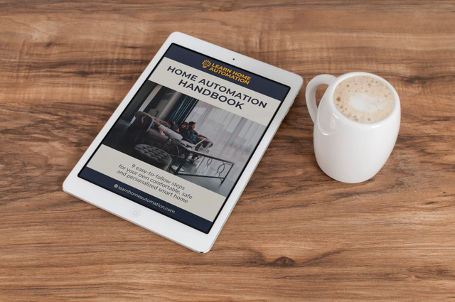 image title A tablet with the home automation handbook open